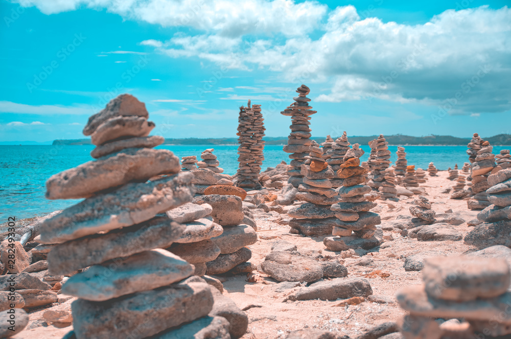 Stone stacked at the beach of Burias Island, Philippines Stone stacked at the beach of Burias Island, Philippines