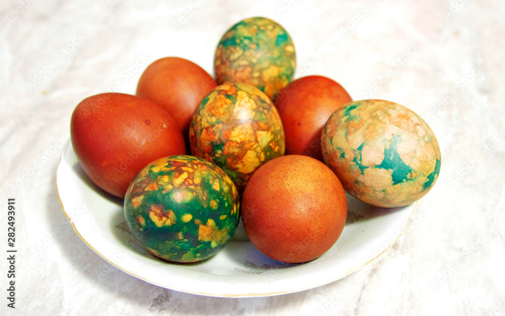 Colorful Easter Eggs On White Plate Placed By Heap Colorful Easter Eggs On White Plate Placed By Heap