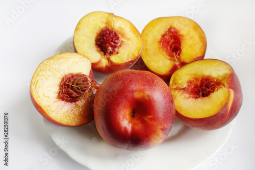 Ripe peach/.nectarine fruits isolated on white background