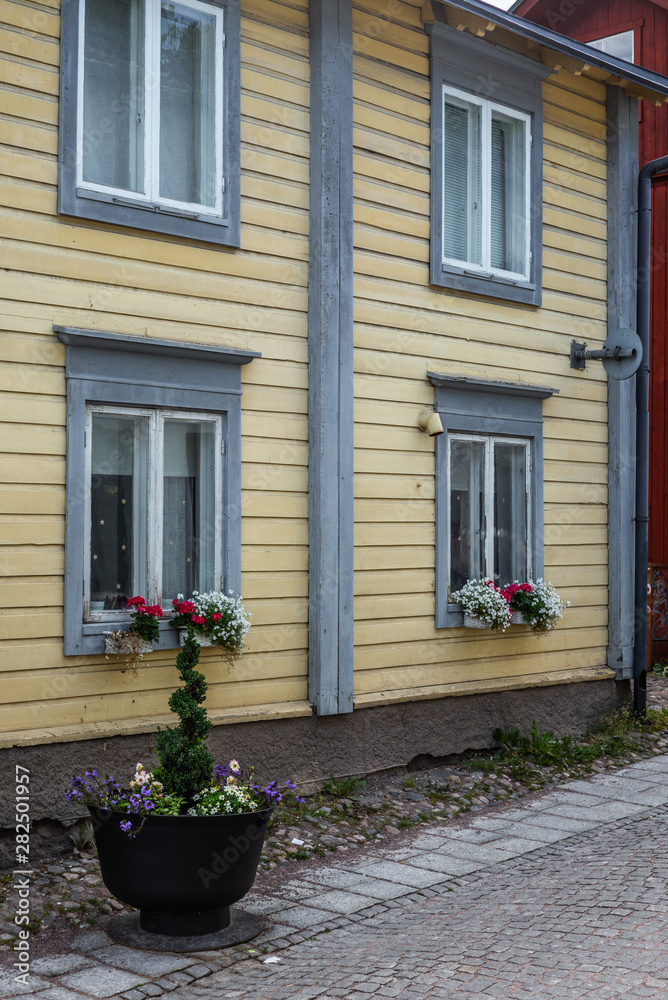 Cobbled streets and colorfully painted old wooden houses in Porvoo in Finland in a summer evening - 4