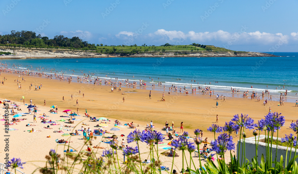 Santander, Spain - July 14, 2019: Beach in Santander, Spain. Resort town known for its sandy beach