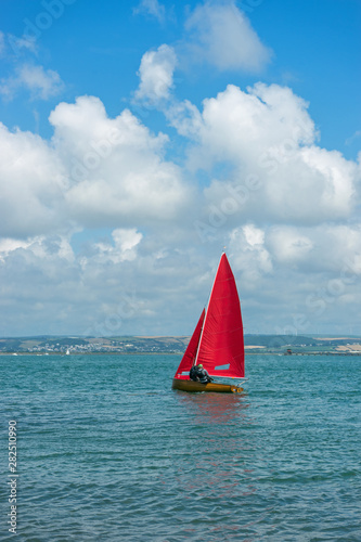 Red yacht on the Torridge Estuary between Instow and Appledore photo