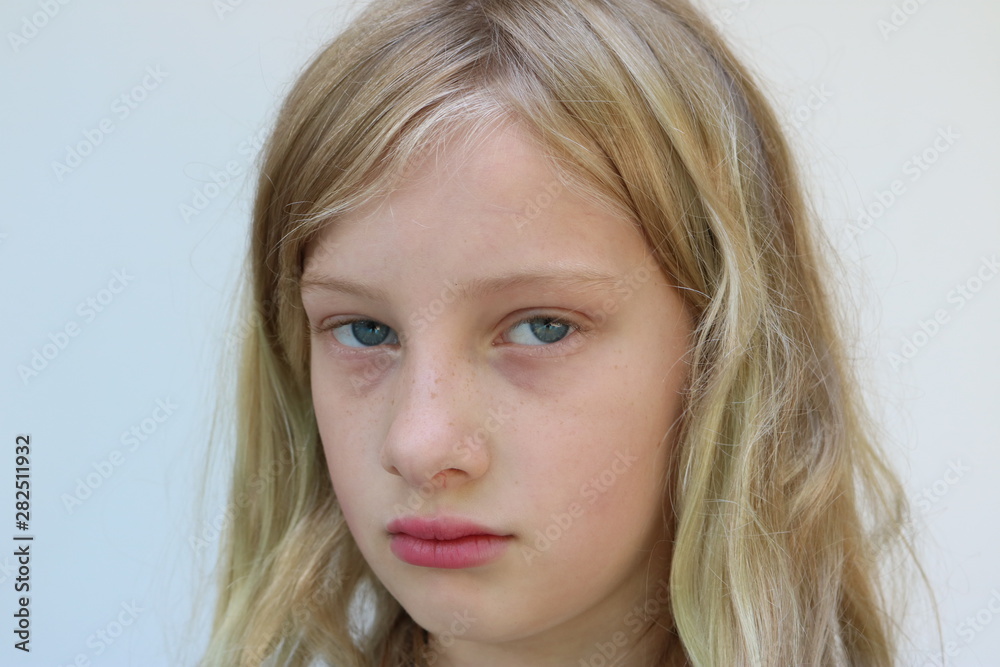 Portrait of a girl looking unhappy and disappointed Portrait of a girl looking unhappy and disappointed