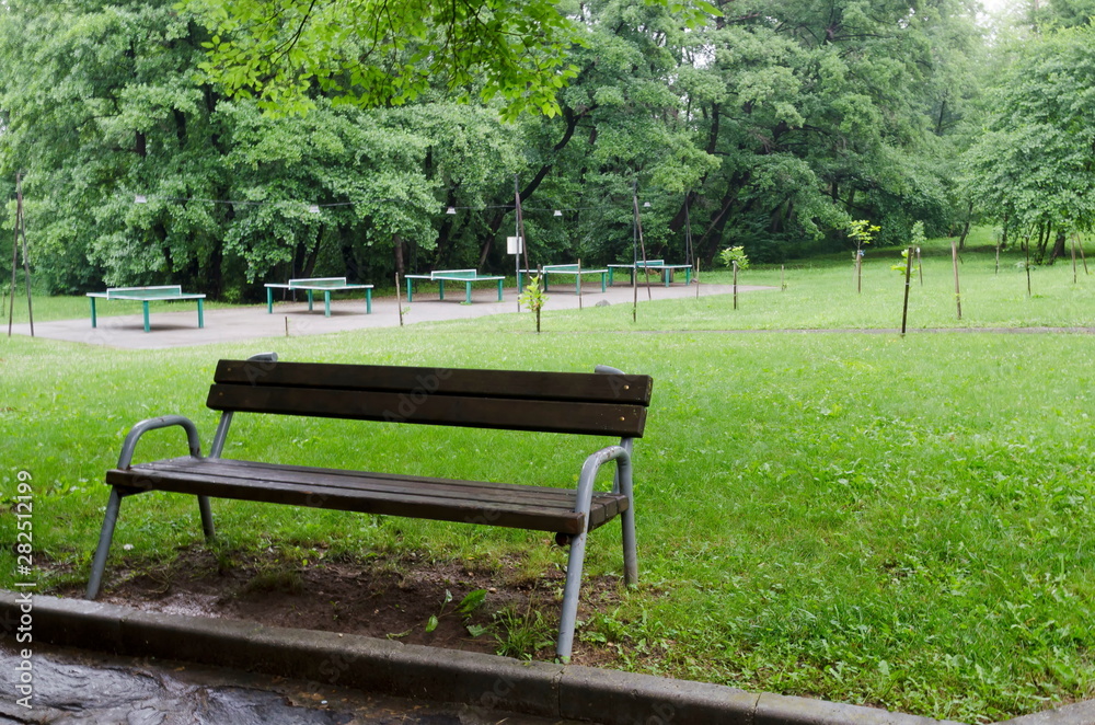 Table Tennis complex with lighting and many tables on a rainy day in rila park near town Dupnitsa, Bulgaria Table Tennis complex with lighting and many tables on a rainy day in rila park near town Dupnitsa, Bulgaria