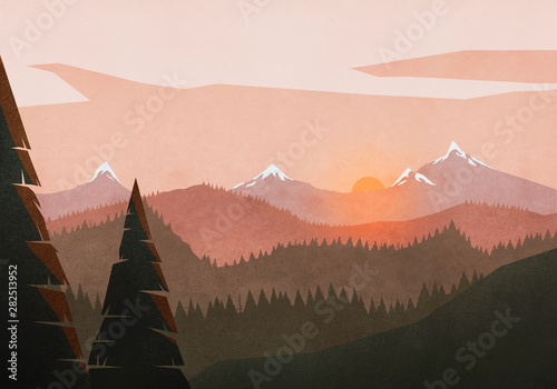 Idyllic, tranquil sunset view over mountain and forest landscape