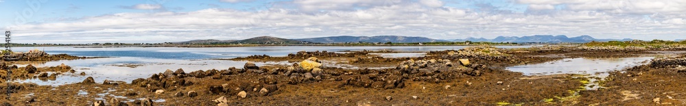 Panorama of Bay with low tide and mountains in Carraroe Panorama of Bay with low tide and mountains in Carraroe