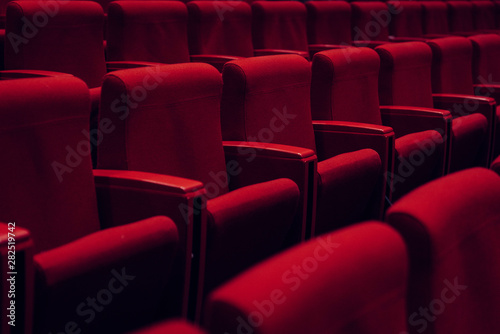 Red theater seats in a row photo