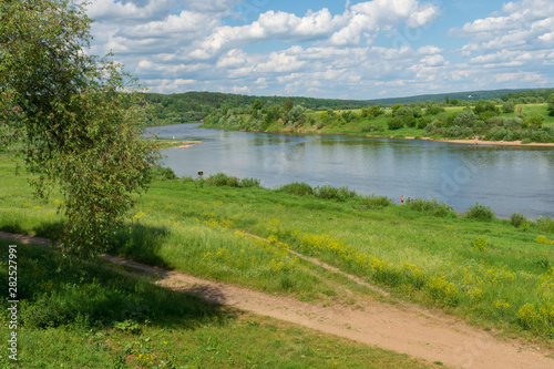 Beautiful view from the hill to the Oka and bewitching clouds in the blue sky