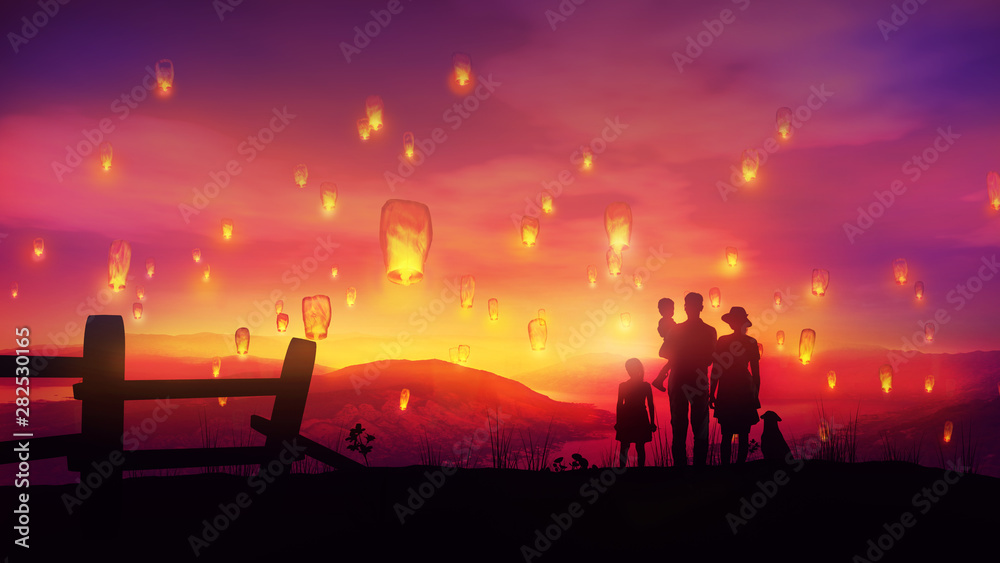Family with children watching at Chinese lanterns at fabulous sunset