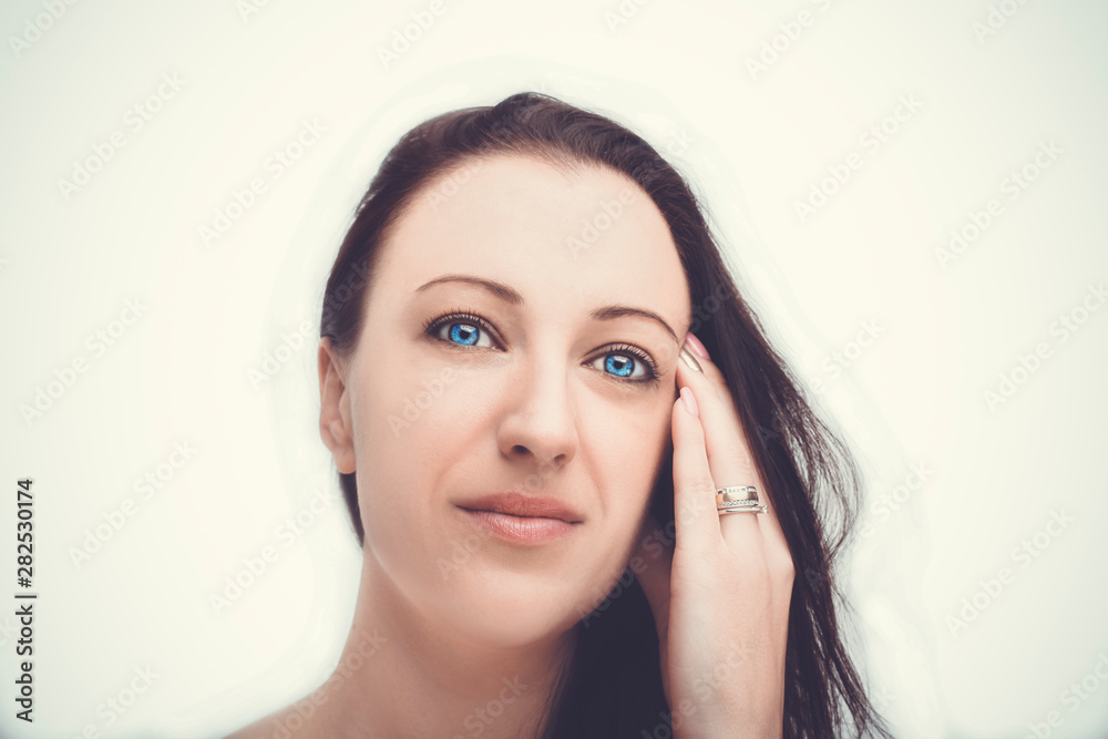 A portrait of beautiful face with beautiful eyes - isolated on white. A portrait of beautiful face with beautiful eyes - isolated on white.