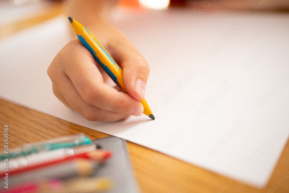 child drawing with color pencils, back to school child drawing with color pencils, back to school