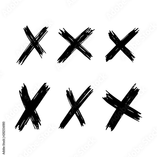 Black Hand drawn cross symbol