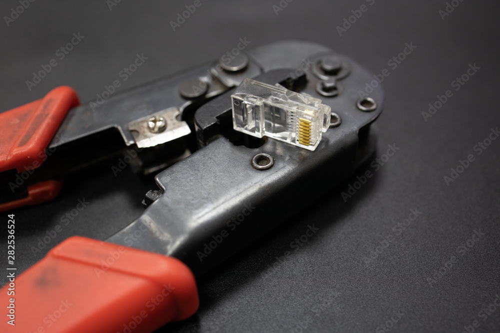 making crimp for ethernet network rj45 wire with crimping tool. step by step process. making crimp for ethernet network rj45 wire with crimping tool. step by step process.