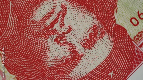 Portrait of Ernesto Che Guevara on Cuban Peso Money. Close up moving around footage.