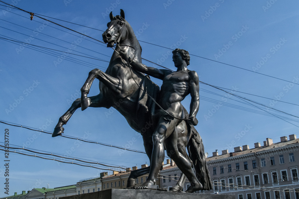 Saint Petersburg, Russia - September 18, 2018: Horse tamers sculpture by Peter Klodt on Anichkov bridge built in 1841