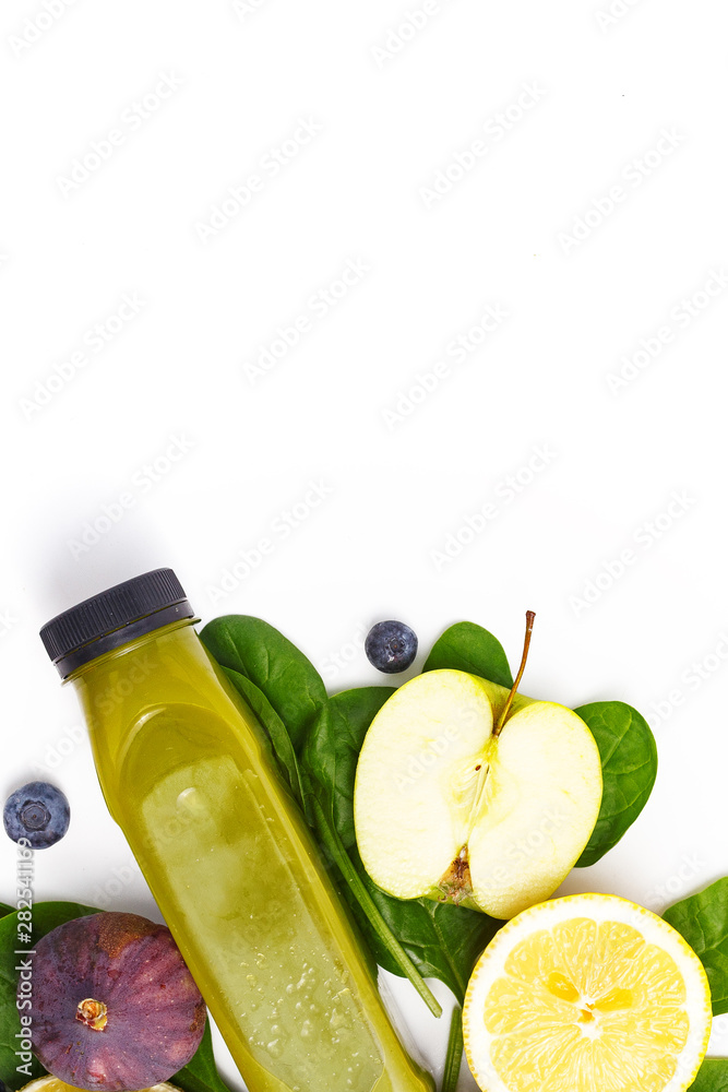 Vegetable smoothie in composition with raw vegetables and green fruits. Healthy eating concept Vegetable smoothie in composition with raw vegetables and green fruits. Healthy eating concept