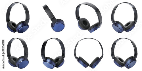 Set of modern headphones on white background