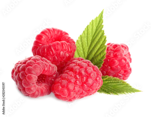 Delicious ripe sweet raspberries with leaves isolated on white