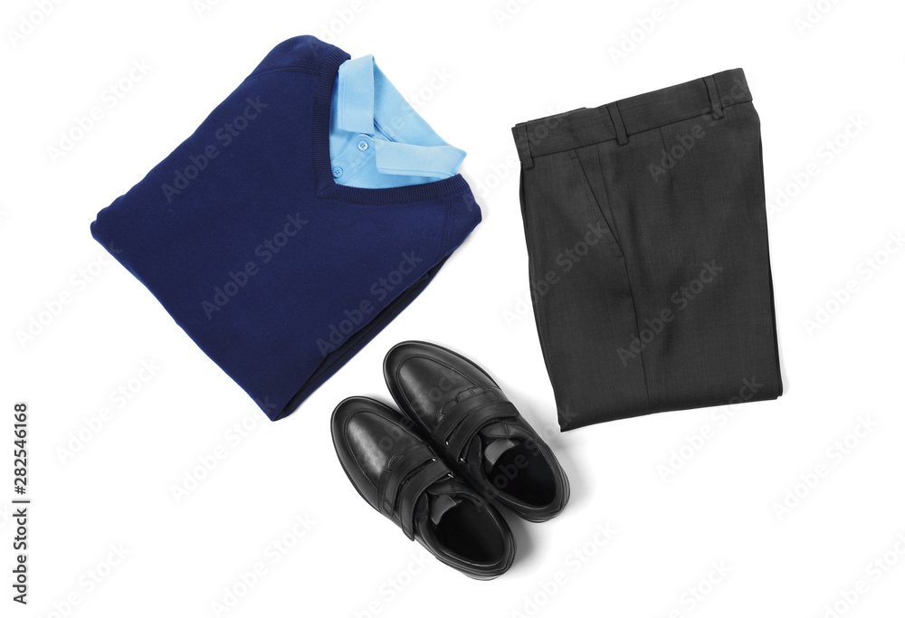 New stylish school uniform on white background, top view New stylish school uniform on white background, top view