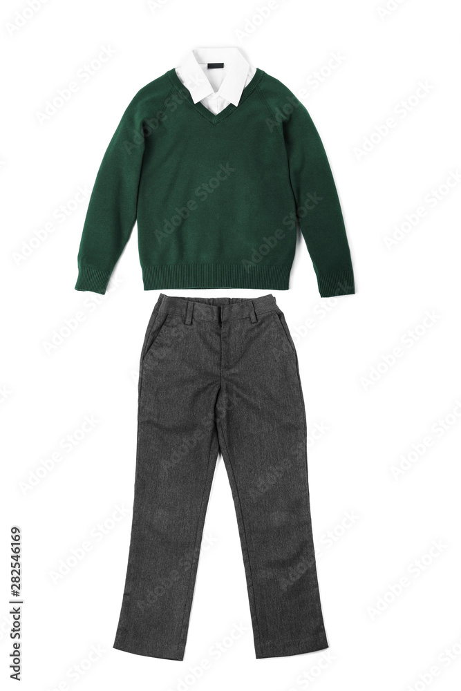 New stylish school uniform on white background, top view New stylish school uniform on white background, top view