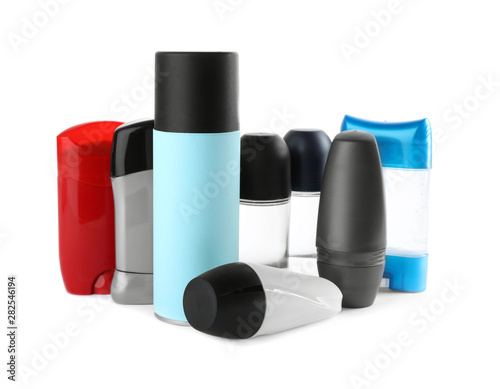 Set of different male deodorants on white background