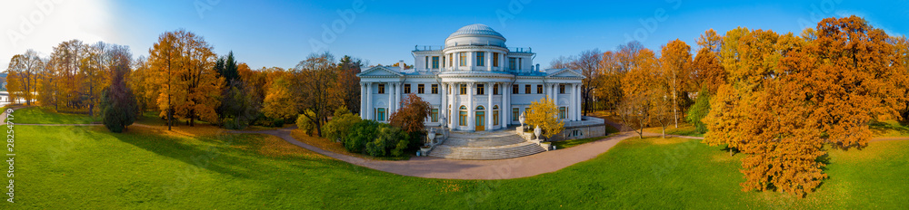 Russia. Panorama Of St. Petersburg. Autumn Petersburg. Parks SPb. The Museums Of St. Petersburg. Autumn in Russia. Elagin island. The Palace in the autumn Park. Trees with yellow leaves