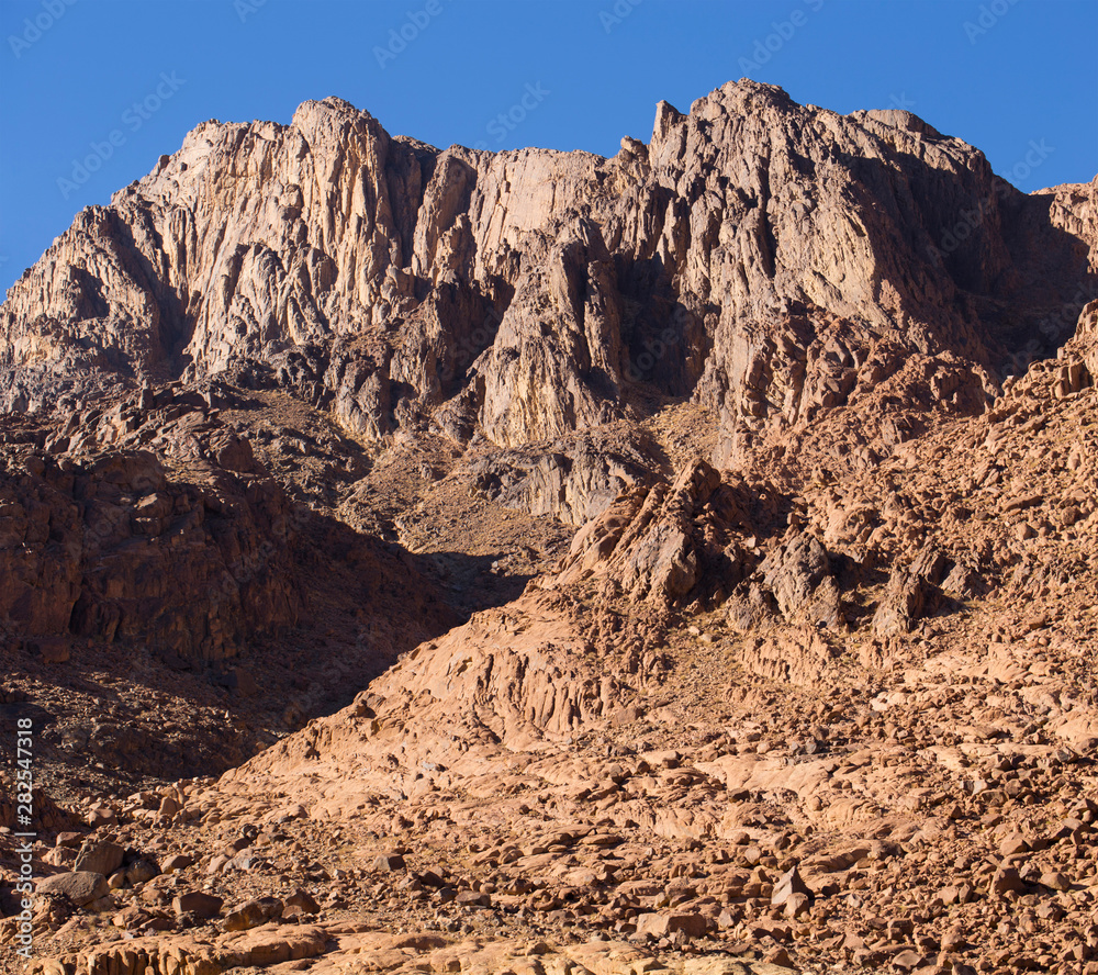 Fototapeta premium Egypt. Mount Sinai in the morning at sunrise. (Mount Horeb, Gabal Musa, Moses Mount). Pilgrimage place and famous touristic destination.