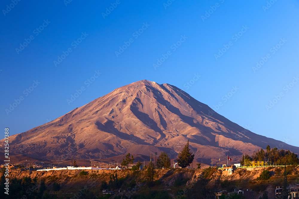 The Misti Volcano, which is a symbol of the closeby city of Arequipa in Southern Peru, lit by the evening sun