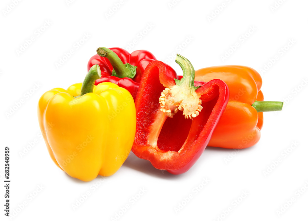 Whole and cut bell peppers on white background Whole and cut bell peppers on white background