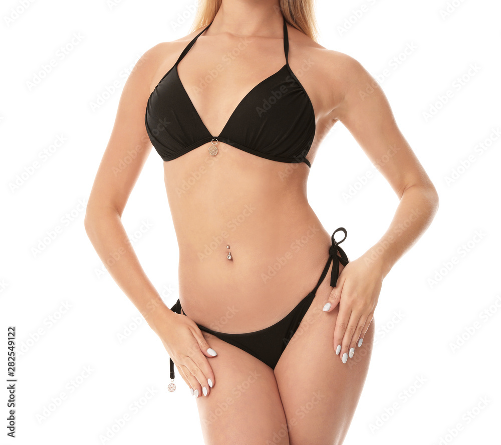 Young woman wearing stylish bikini on white background