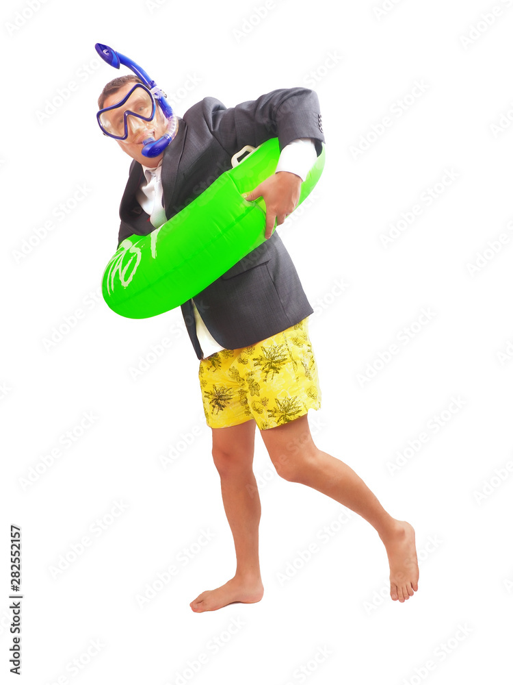Businessman with a green inflatable circle. Vacation concept