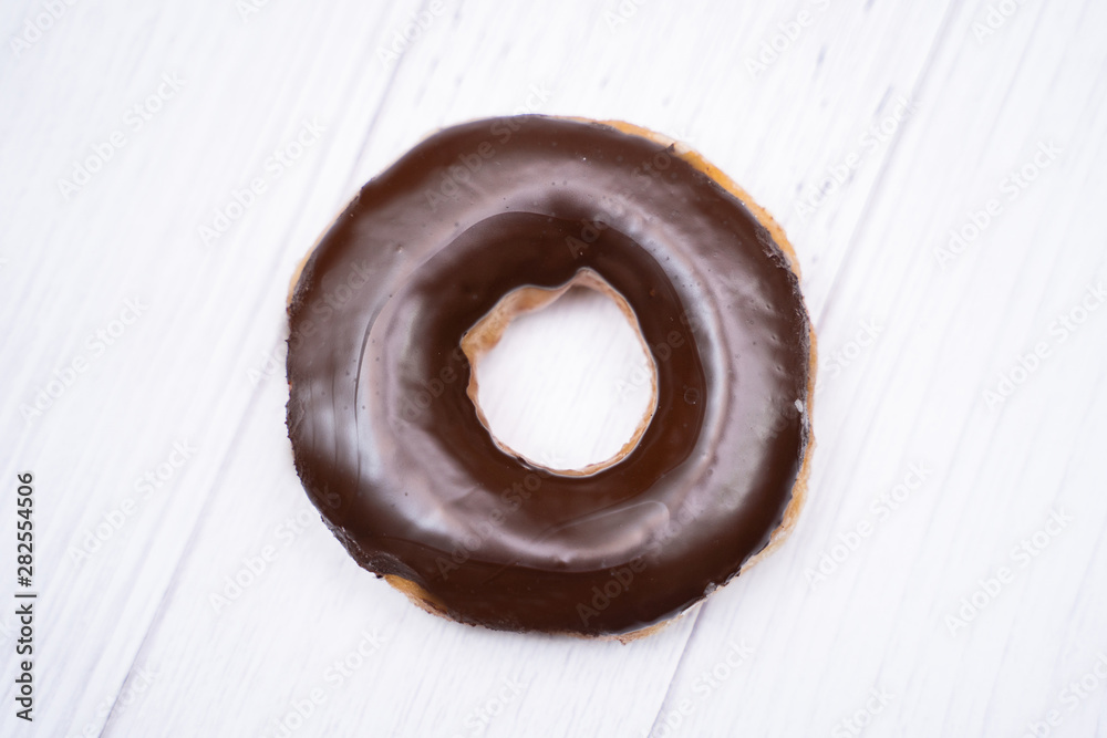 close up chocolate coating doughnut close up chocolate coating doughnut