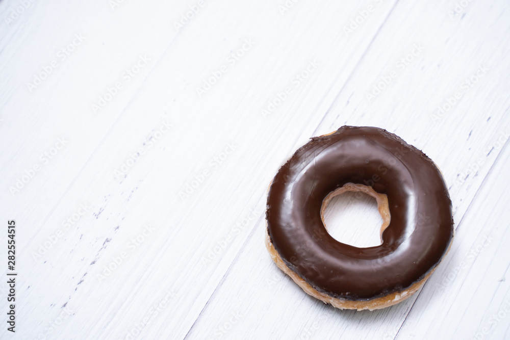 close up chocolate coating doughnut close up chocolate coating doughnut