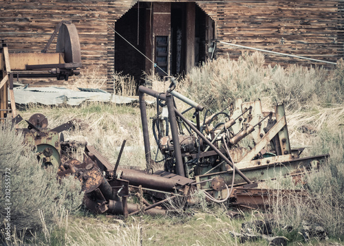 Old Machinery by an Abandoned Grain Elevator