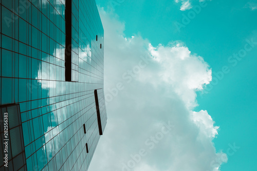 Blue sky and clouds in reflection of skyscraper in New York City