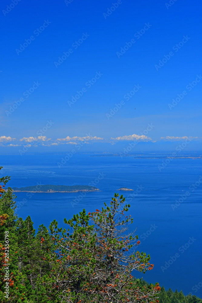Panoramic view of the San Juan Islands with Mount Baker in the background as seen from Mount Constitution on Orcas Island, Washington
