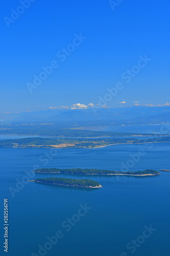 Panoramic view of the San Juan Islands with Mount Baker in the background as seen from Mount Constitution on Orcas Island, Washington © Euskera Photography