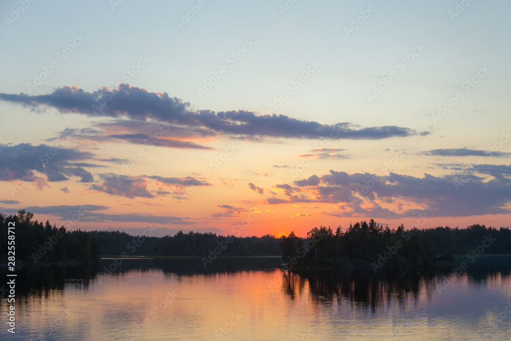 forest lake at dramatic sunset