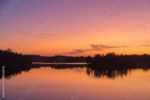 dramatic twilight on a forest lake