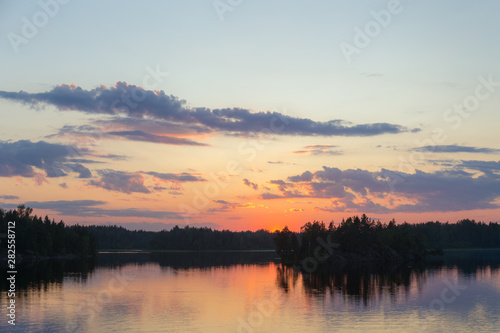 forest lake at dramatic sunset