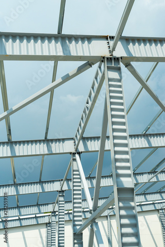 metal support poles in an industrial building warehouse
