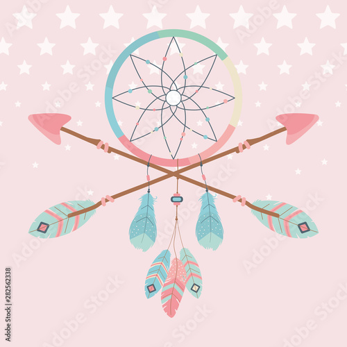 dream catcher hanging with indian arrows boho style