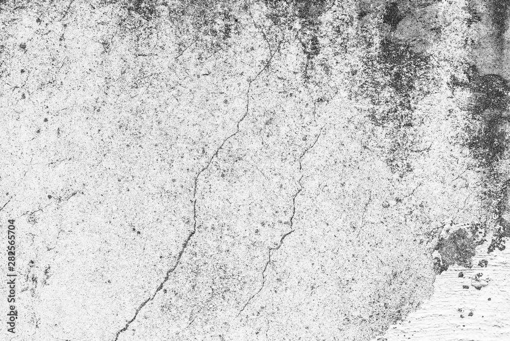 Texture of a concrete wall with cracks and scratches which can be used as a background Texture of a concrete wall with cracks and scratches which can be used as a background