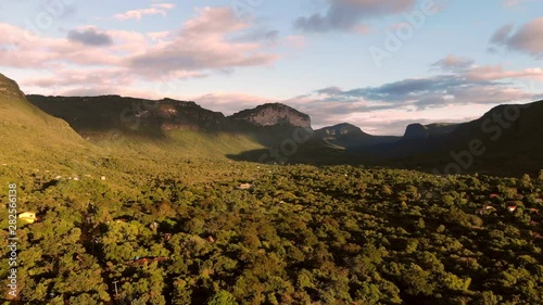 Aerial of Vale do Capao magic hour. Chapada Diamantina, Palmeiras, Bahia, Brazil. Drone flying forward. photo