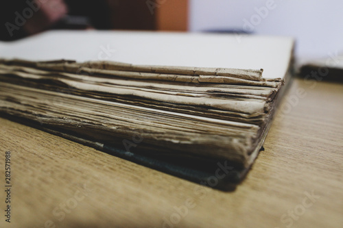 Old papers, books and documents containing historical archives