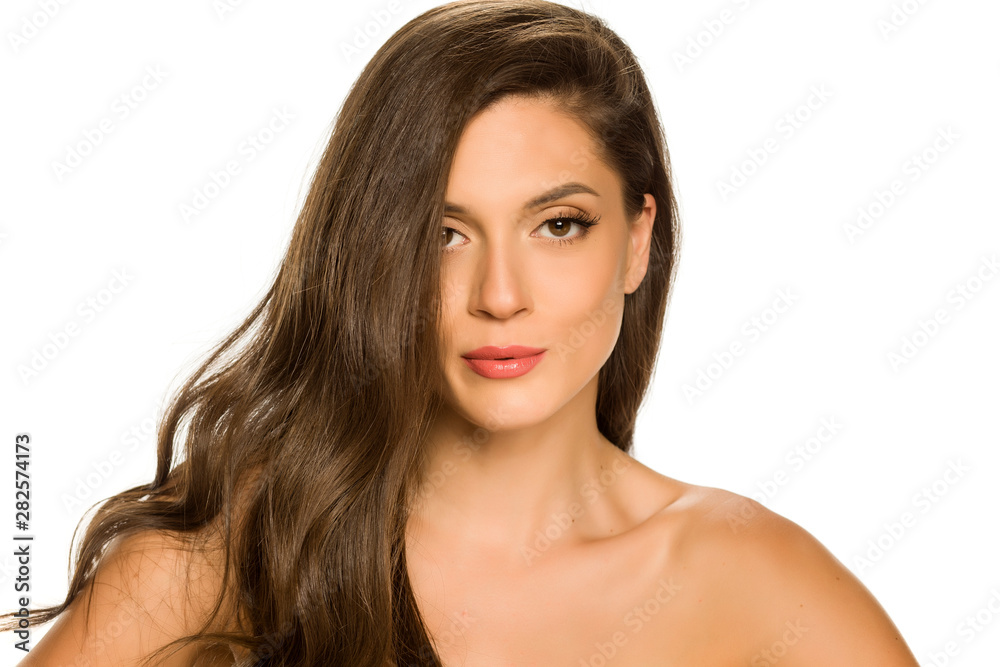 Portrait of a young beautiful woman on a white background Portrait of a young beautiful woman on a white background