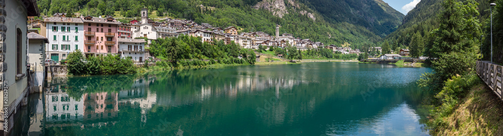 Carona. Bergamo, Orobie, Italian Alps, Italy. Landscape at the artificial lake and the village. Summer time