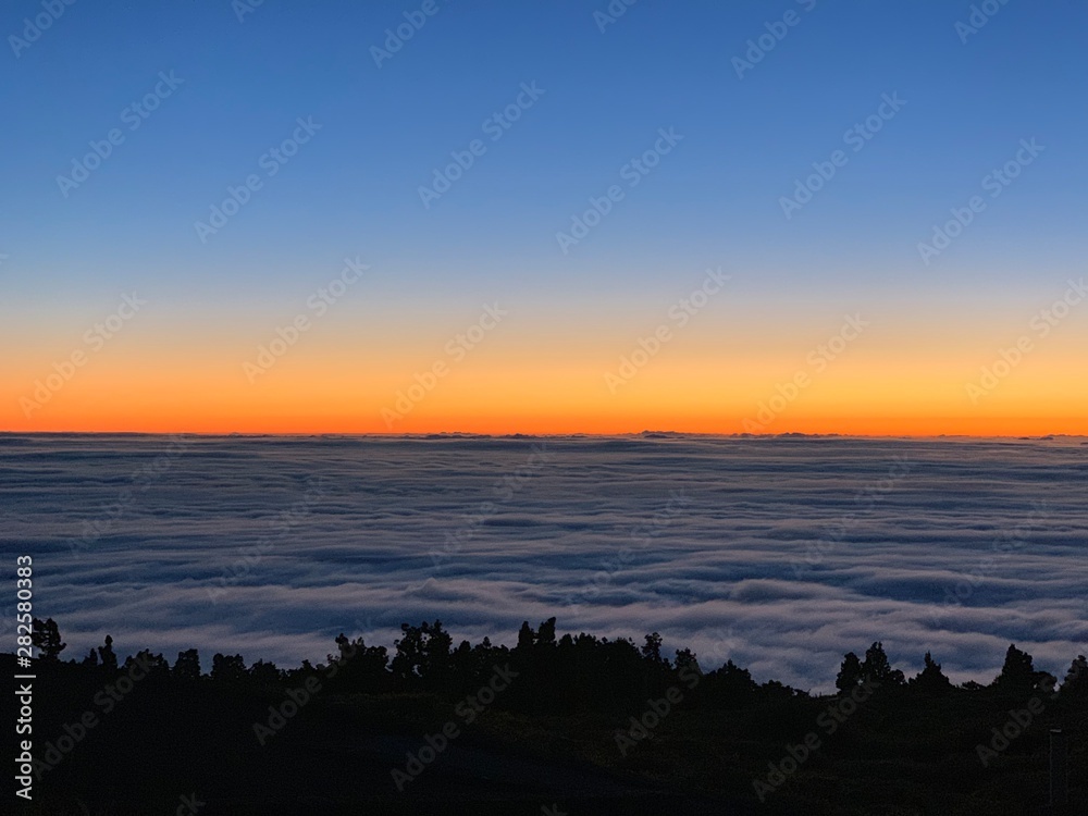 Afterglow Sunset above the clouds
