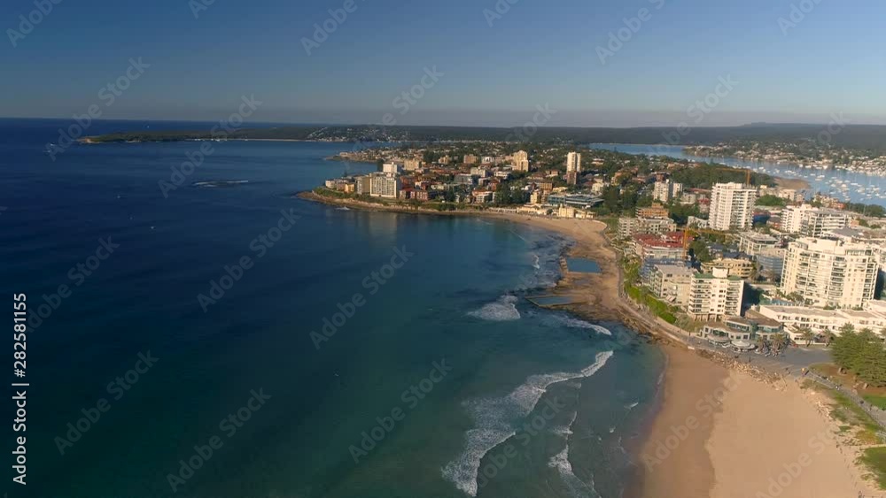 Drone Aerial Shot of Sydney Beach - Cronulla Early Morning / Blue Skies - 4K 50FPS Slowmo