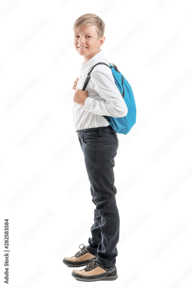 Cute little schoolboy on white background Cute little schoolboy on white background